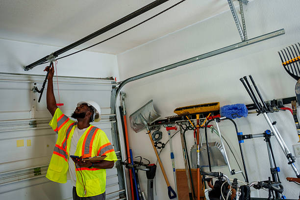 Professional Garage Door Installation technician working in East Missoula, MT